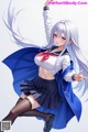 A girl in a school uniform with long white hair and a blue cape.